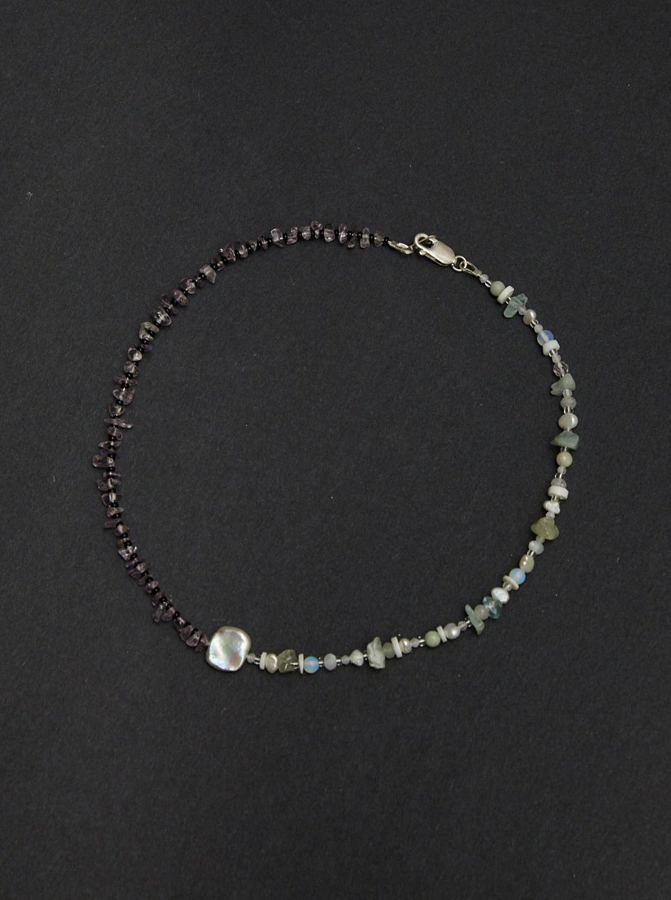 diving off rocks in caprera necklace